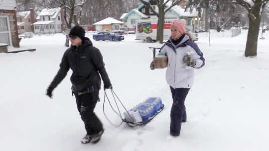 Delivering bottled water in Flint in January. Michigan State Police/Flickr, CC BY-ND