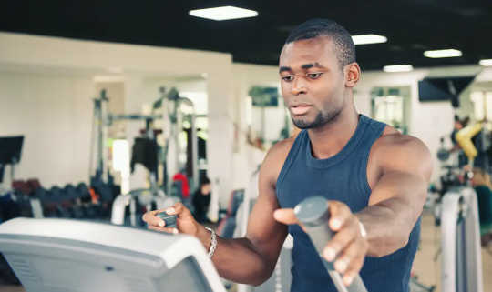 Young man training in the gym.