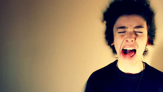 Are Women Really More Emotional Than Men? a young man screaming