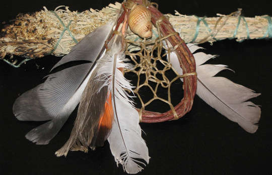 Cleansing, Grounding, and Protecting: Two Foundational Practices sage smudge sticks, feathers, and a dreamcatcher