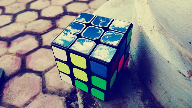 4 Simple Steps to Transform an Uncontrolled Mind into a Creative Mind rubik's cube with artistic drawings on the top