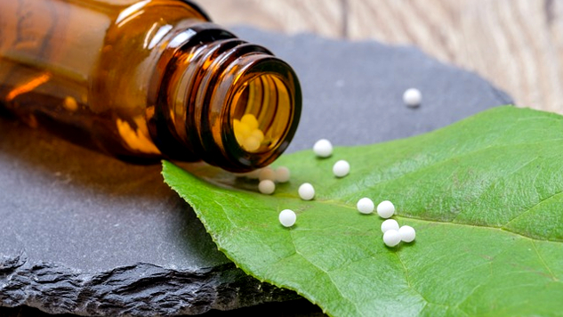 The Law of Similars: Homeopathy and Nano-Medicine homeopathic globules poured out on a leaf