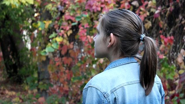 The Miracle Comes Together...Just Like That! young woman looking out at some trees