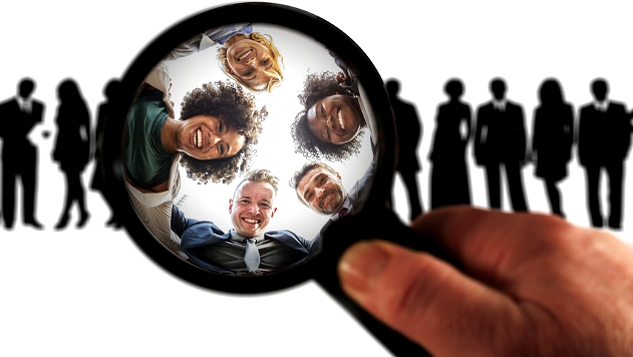 Where Focus Goes, Energy Flows a line of people in the distance, with a magnifying glass over a few of them showing smiling loving faces