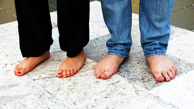 How to Go All-In to Live Your Best Life two pairs of bare feet standing firm