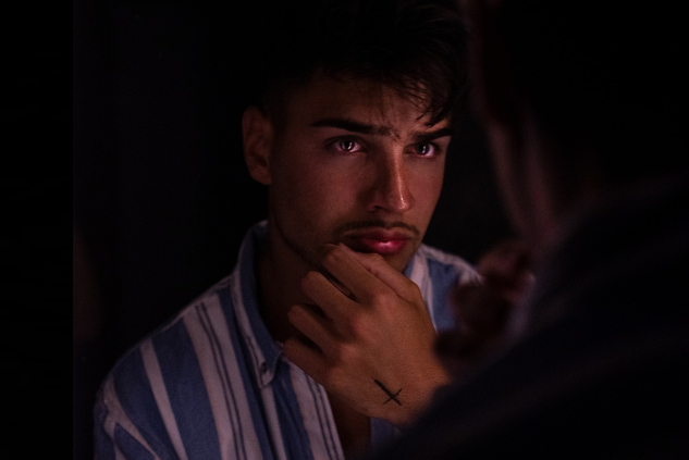 How You Talk to Yourself Matters close up of a man looking at himself in the mirror