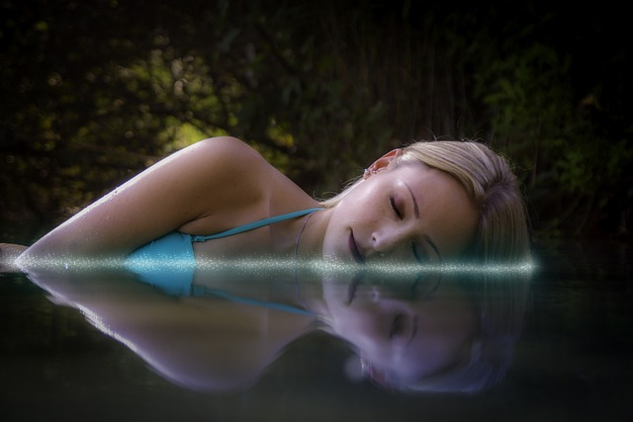 Butterfly Dreaming: Awaken in the Dream woman laying down, sleeping in the water