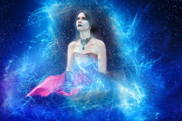It’s All in the Listening: Trusting the Innate Wisdom of the Body sitting woman surrounded by energy and the starry heavens
