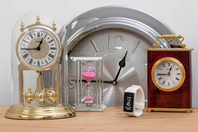 Change Your Life with the 15-Minute Method various clocks and watches all showing 15 minutes to 1