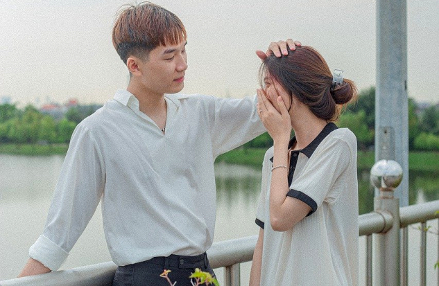 Our Cancer Journey: Learning Strength and Being Love a couple standing together, she with her hands over her face, and he with a gentle hand on her head
