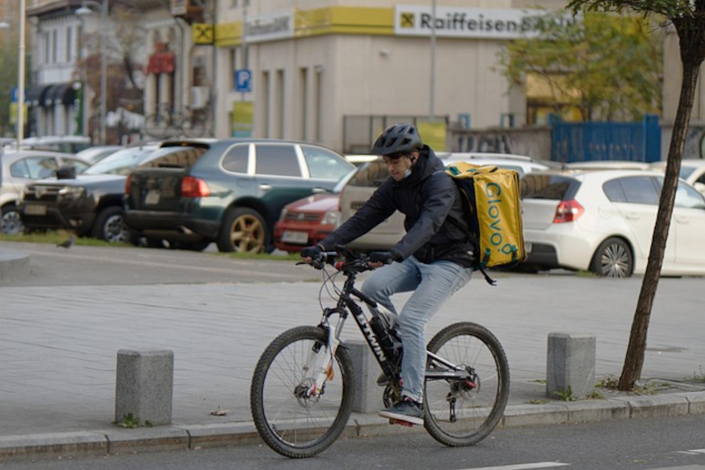 Context Is Everything a man riding a bicycle.